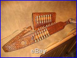 Custom leather sling and stock wrap for a Marlin model 336 30-30 hand tooled