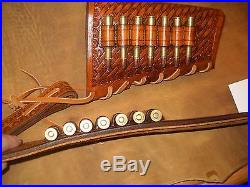 Custom leather sling and stock wrap for a Marlin model 336 30-30 hand tooled