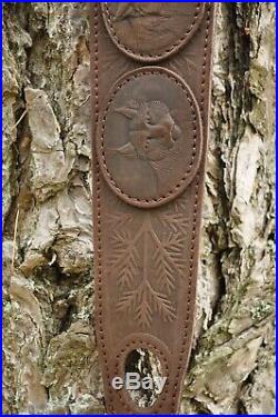 Genuine Leather Rifle or Shotgun sling decorated with pictures of animals