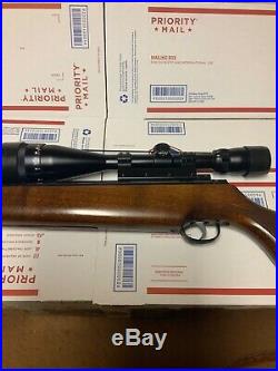 Vintage Beeman Kodiak air rifle. 25 cal withswift scope 6-18x50 and leather sling